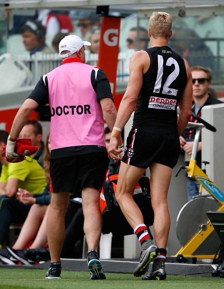 AFL 2016 Rd 03 - St Kilda v Collingwood MELBOURNE, AUSTRALIA - APRIL 9: Nick Riewoldt of the Saints comes off the ground injured during the 2016 AFL Round 03 match between the St Kilda Saints and the Collingwood Magpies at the Melbourne Cricket Ground, Melbourne on April 9, 2016. (Photo by Adam Trafford/AFL Media)